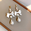White Bow Baroque Pearl Drop Statement Earrings Pair view 6