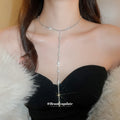 Crystal Y Drop Necklace With Polished Metal Tone Details view 1
