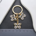Black Butterfly Enamel Charm Keychain with Gold Tone Hardware view 3