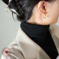 Gold Oval Huggie Hoop Earrings White Glass Pearl Drop view 3