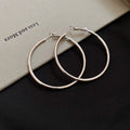 Slim Polished Metal Hoop Earrings in Three Size and Color Options view 8