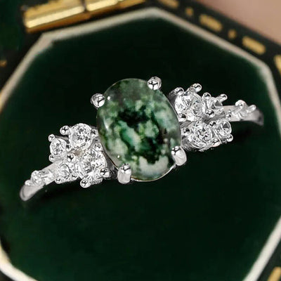 Image 1 showing green marbled oval crystal ring