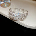 Three Or Five Row Pearl Like Crystal Open Cuff In Gold Or Silver Tone view 8