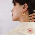 Gold And Steel Geometric Square Open Stud Earrings view 1