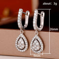 Silver Teardrop Halo Dangle Earrings In A Polished Decorative Design view 5