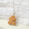 Silver Tone Gingerbread Figure Pendant Necklace and Hook Earrings view 4