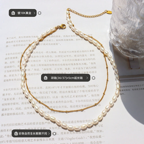 Pearl and gold chain necklace flat lay with plating and length labels