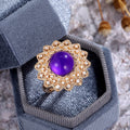 Gold Tone Purple Cabochon Floral Statement Ring With Polished Clear Stone Detail view 3