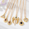 Gold Tone Crystal Angel Heart and Geometric Pendant Necklaces view 1