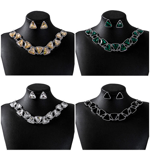 Four color geometric triangle necklace earring sets on black mannequin busts