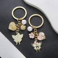 Pink Blue and Purple Heart Pearl Flower Butterfly Keychain Collection view 2
