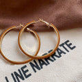 Velvet Wrapped Hoop Earrings in Five Rich Colors with Metal Tone Details view 10