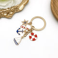 Red Blue Nautical Lighthouse Anchor and Sailboat Keychain Set view 3