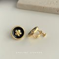 Black Enamel Gold Camellia Round Clip Stud Earrings view 6
