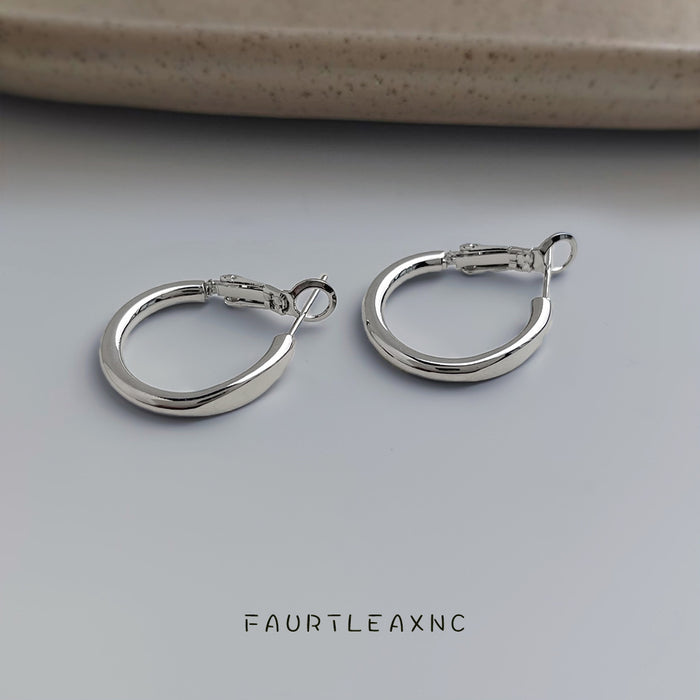 Silver Tone Small Oval Hoop Earrings With Lever Back Closure