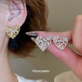 Openwork Heart Stud Earrings in Silver and Gold Tones view 2
