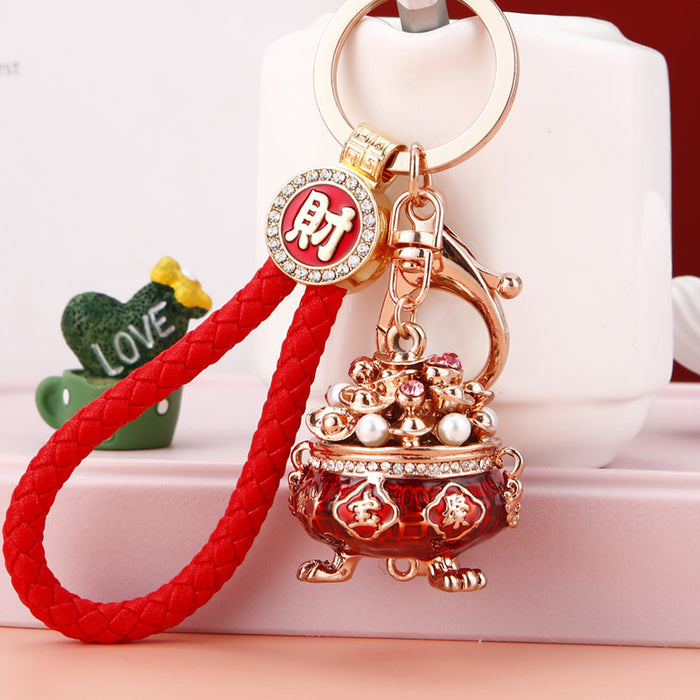 Pearl Filled Treasure Bowl Keychains in Red Gold and Purple