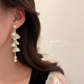 White Floral Pearl and Crystal Chain Drop Earrings view 4