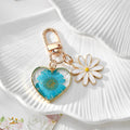 Gold Tone Daisy and Pressed Flower Heart Snap-Hook Keychains in Ten Options view 11