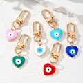 Gold Tone Heart Enamel Evil Eye Clip Keychains in Six Colors view 1