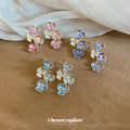 Pastel Crystal Flower Drop Earrings in Pink and Blue view 2