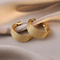 Gold Tone Textured Wide Huggie Hoop Statement Earrings view 2