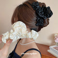 Black Ruffled Fabric Claw Hair Clip With Pearl Accent view 1