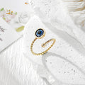 Twisted Band Blue Evil Eye Open Rings in Four Finishes view 6