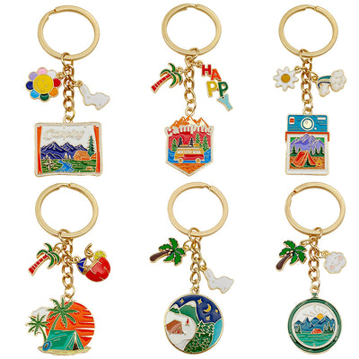 Overview showing the available color and design variations of the camping car tent and palm tree metal keychain