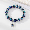 Silver Tone Blue Evil Eye Bead Stretch Bracelets with Six Charms view 3