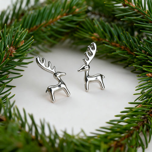 Image 2 showing reindeer silhouette stud earrings