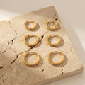 Gold Steel Twisted Hoop Earrings Three Sizes 316L Steel view 4