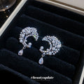 Silver Tone Crystal Crescent Earrings With Teardrop Dangles view 4