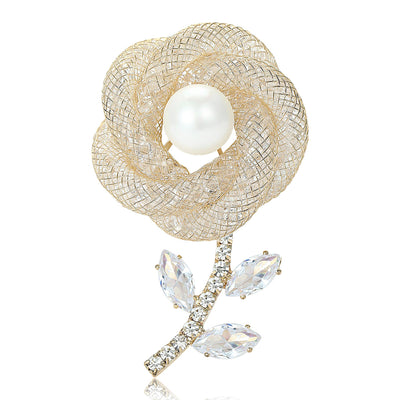 Front view of a gold-tone mesh flower with a large pearl center and crystal stem