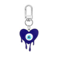 Twelve Piece Silver Tone Butterfly Owl and Evil Eye Keychain Set view 4