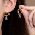 Gold Tone Open Loop Earrings With Deep Blue Rectangle Drops view 2