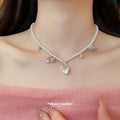 Pearl Bead Necklace with Butterfly and Pastel Stone Charms view 3