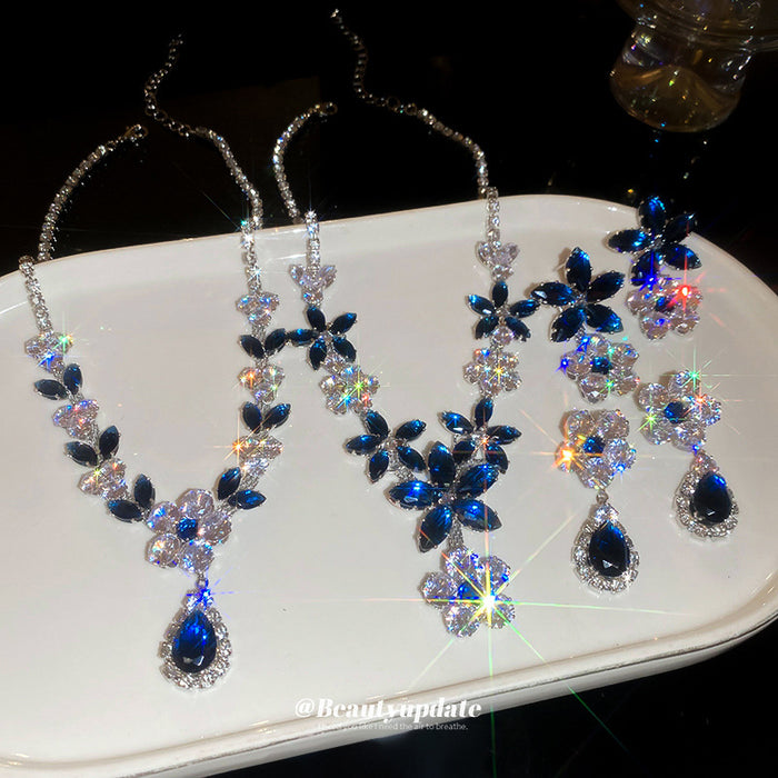 Deep Blue Flower And Teardrop Crystal Earrings And Necklace In Silver Tone