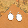 Small Oval Plain Pendant Trays in Antique Bronze and Silver view 4