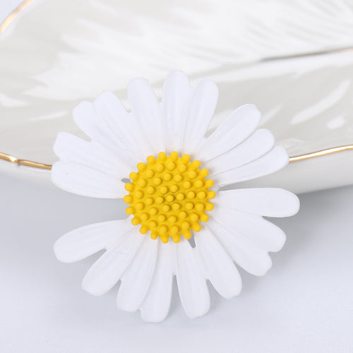 Matte Daisy brooch shown in angled product view