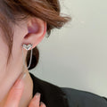 Silver Tone Asymmetric Heart Chain Stud Earrings with Polished Metal Finish view 2