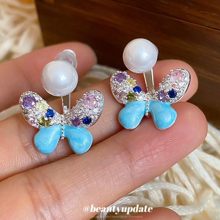 Blue Butterfly Stud Earrings with Crystals and Pearl Like Tops