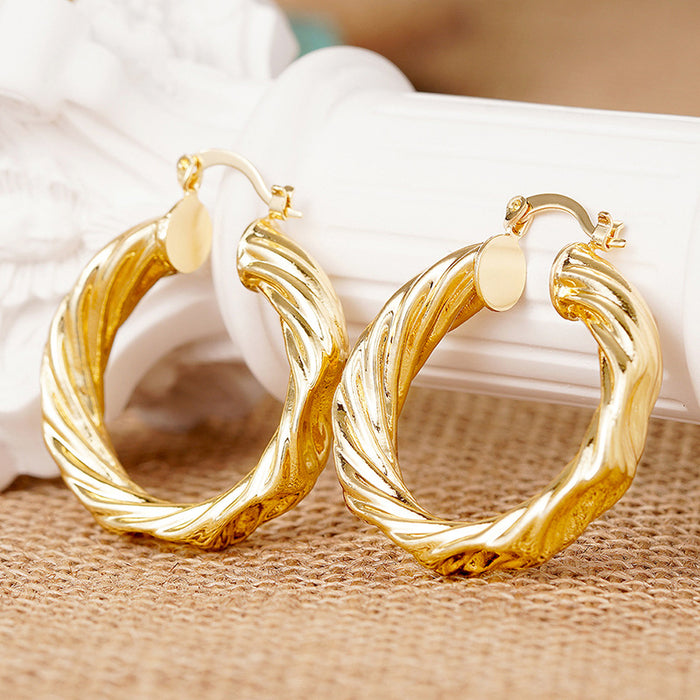 Gold Tone Wavy Concave Twisted Side Hoop Latch Earrings