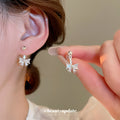 Silver Tone Crystal Bow Stud Earrings with Short Drops view 2