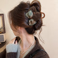 Brown Fuzzy Bow Petal Hair Claw With Blue And Brown Patterned Loops view 1