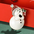 Pearlescent Snowman Brooch With Faceted Crystals And Polished Metal Details view 4