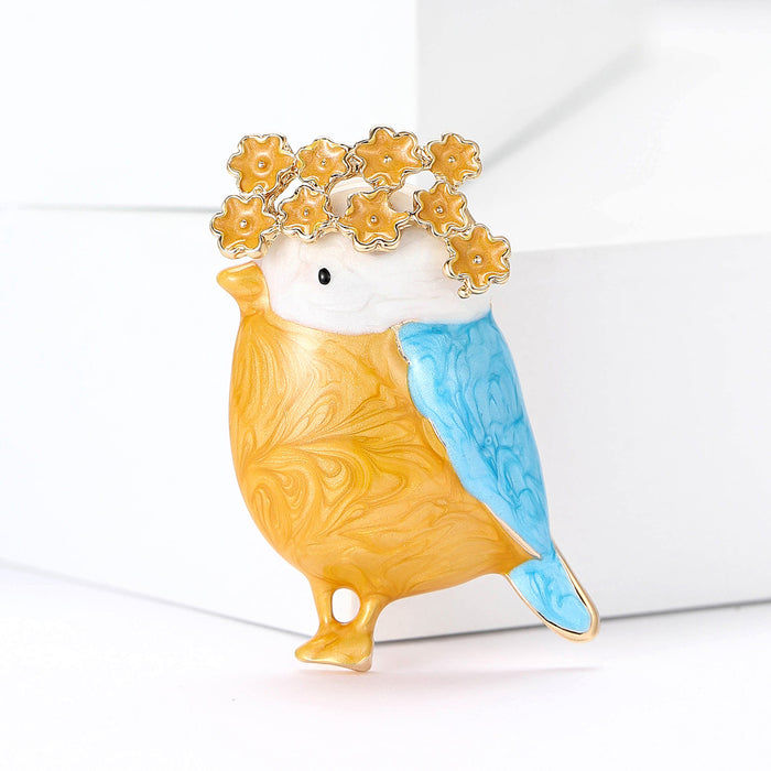 Yellow Bird Brooch with Blue Wing and Flower Crown