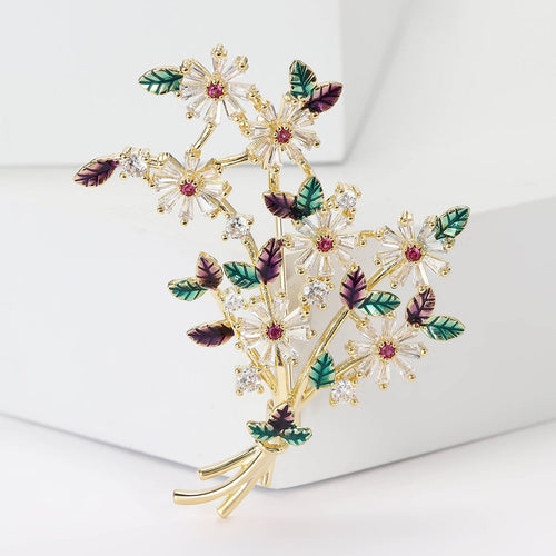 Front view of daisy bouquet brooch with multicolor enamel leaves