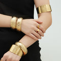 Gold Steel Wide Sunburst Cuff And Textured Hinge Bangles view 2