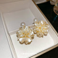 White Flower Cluster Stud Earrings With Pearl Look Centers view 2